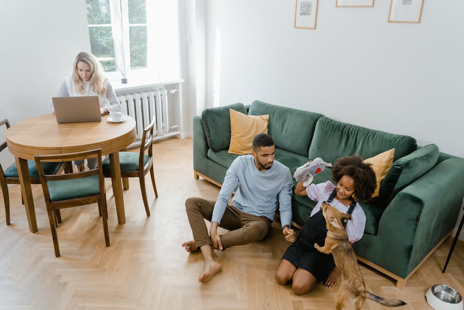 A family enjoying quality time with their dog in a contemporary living room setting.